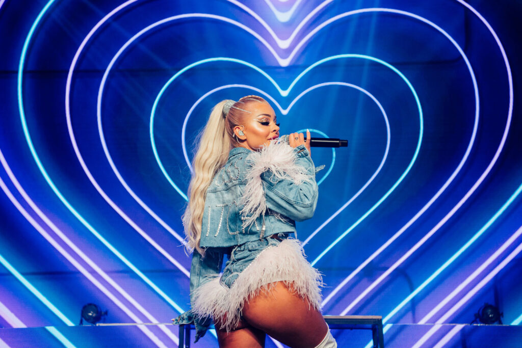 Concert of the female rapper Katja Krasavice in front of a heart shaped stage